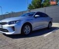 Серый Киа K5, объемом двигателя 2 л и пробегом 240 тыс. км за 10200 $, фото 1 на Automoto.ua