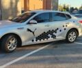 Серый Киа K5, объемом двигателя 2 л и пробегом 314 тыс. км за 10900 $, фото 1 на Automoto.ua