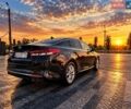 Серый Киа K5, объемом двигателя 2 л и пробегом 125 тыс. км за 13399 $, фото 1 на Automoto.ua
