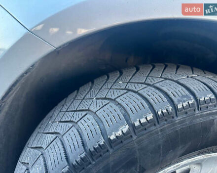 Серый Киа K5, объемом двигателя 2 л и пробегом 292 тыс. км за 11000 $, фото 16 на Automoto.ua