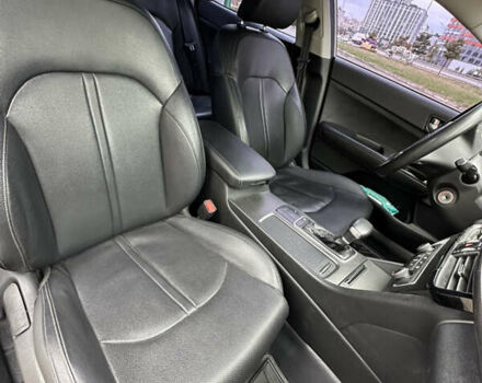 Серый Киа K5, объемом двигателя 2 л и пробегом 305 тыс. км за 10850 $, фото 6 на Automoto.ua