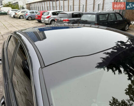 Серый Киа K5, объемом двигателя 2 л и пробегом 153 тыс. км за 13500 $, фото 9 на Automoto.ua