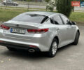 Серый Киа K5, объемом двигателя 2 л и пробегом 305 тыс. км за 10850 $, фото 2 на Automoto.ua