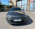 Серый Киа K5, объемом двигателя 2 л и пробегом 164 тыс. км за 13600 $, фото 1 на Automoto.ua