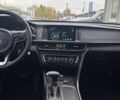 Серый Киа K5, объемом двигателя 2 л и пробегом 244 тыс. км за 11990 $, фото 8 на Automoto.ua