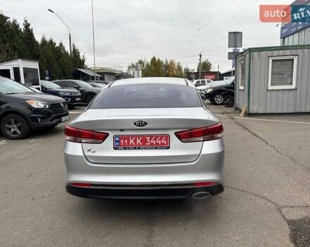Серый Киа K5, объемом двигателя 2 л и пробегом 244 тыс. км за 11990 $, фото 3 на Automoto.ua