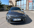 Серый Киа K5, объемом двигателя 2 л и пробегом 164 тыс. км за 13000 $, фото 1 на Automoto.ua