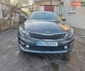Серый Киа K5, объемом двигателя 2 л и пробегом 249 тыс. км за 12000 $, фото 1 на Automoto.ua