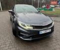 Серый Киа K5, объемом двигателя 2 л и пробегом 238 тыс. км за 14690 $, фото 1 на Automoto.ua