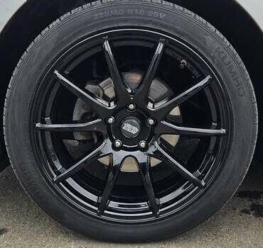 Серый Киа K5, объемом двигателя 2 л и пробегом 206 тыс. км за 14900 $, фото 5 на Automoto.ua