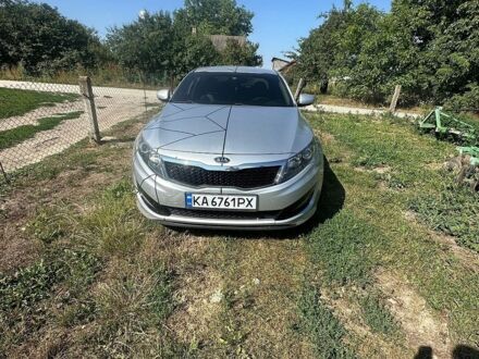 Серый Киа K5, объемом двигателя 2 л и пробегом 263 тыс. км за 7300 $, фото 1 на Automoto.ua