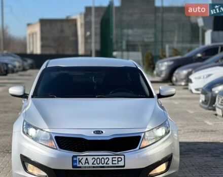 Серый Киа K5, объемом двигателя 2 л и пробегом 450 тыс. км за 7500 $, фото 1 на Automoto.ua