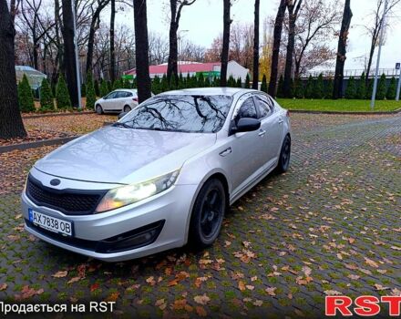Серый Киа K5, объемом двигателя 2 л и пробегом 405 тыс. км за 7500 $, фото 1 на Automoto.ua