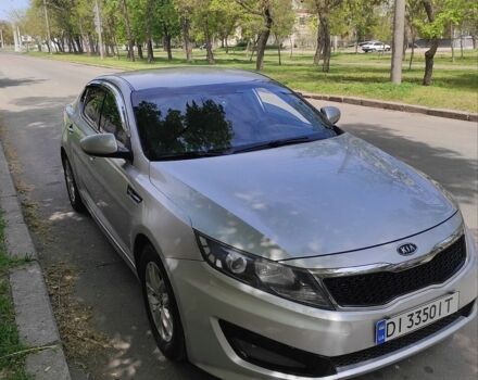 Серый Киа K5, объемом двигателя 2 л и пробегом 333 тыс. км за 8700 $, фото 1 на Automoto.ua