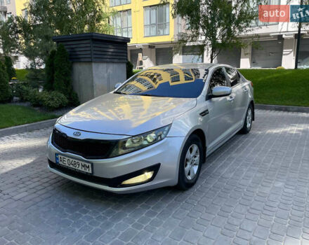 Серый Киа K5, объемом двигателя 2 л и пробегом 230 тыс. км за 6500 $, фото 1 на Automoto.ua