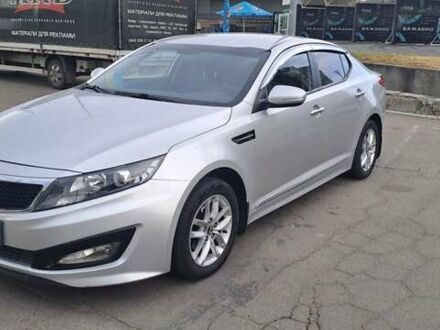 Серый Киа K5, объемом двигателя 2 л и пробегом 316 тыс. км за 7700 $, фото 1 на Automoto.ua