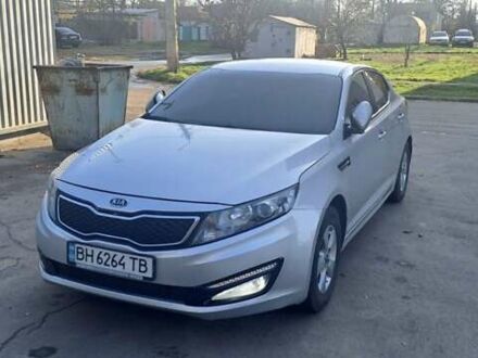 Серый Киа K5, объемом двигателя 2 л и пробегом 230 тыс. км за 7000 $, фото 1 на Automoto.ua