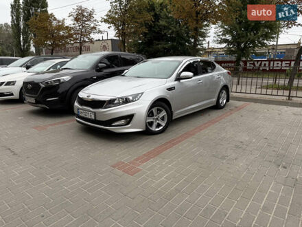 Серый Киа K5, объемом двигателя 2 л и пробегом 280 тыс. км за 7500 $, фото 1 на Automoto.ua