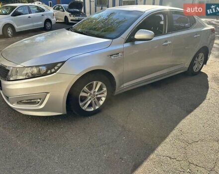 Серый Киа K5, объемом двигателя 2 л и пробегом 280 тыс. км за 6800 $, фото 1 на Automoto.ua