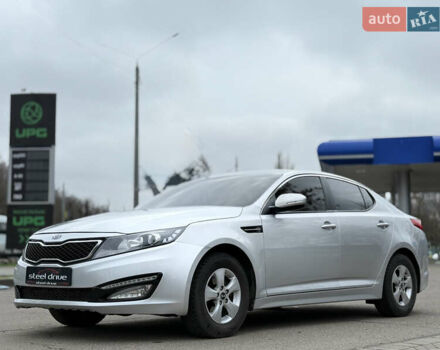 Серый Киа K5, объемом двигателя 2 л и пробегом 230 тыс. км за 7999 $, фото 1 на Automoto.ua