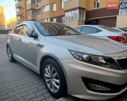 Серый Киа K5, объемом двигателя 2 л и пробегом 420 тыс. км за 9500 $, фото 1 на Automoto.ua