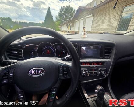 Серый Киа K5, объемом двигателя 2 л и пробегом 232 тыс. км за 10500 $, фото 1 на Automoto.ua