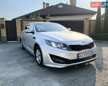 Серый Киа K5, объемом двигателя 2 л и пробегом 415 тыс. км за 6950 $, фото 1 на Automoto.ua