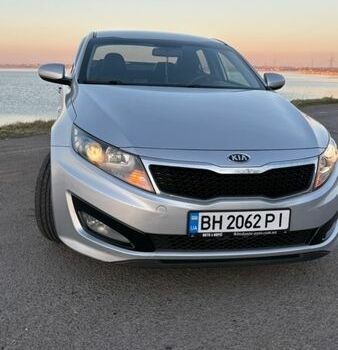Серый Киа K5, объемом двигателя 2 л и пробегом 275 тыс. км за 8200 $, фото 1 на Automoto.ua