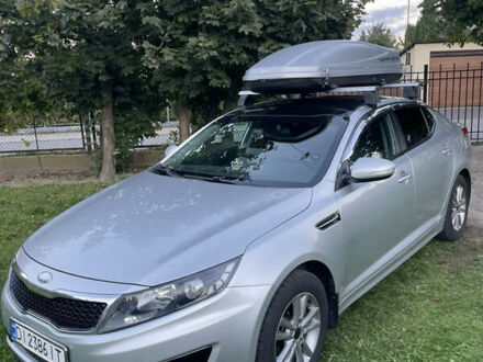 Серый Киа K5, объемом двигателя 2 л и пробегом 285 тыс. км за 8000 $, фото 1 на Automoto.ua