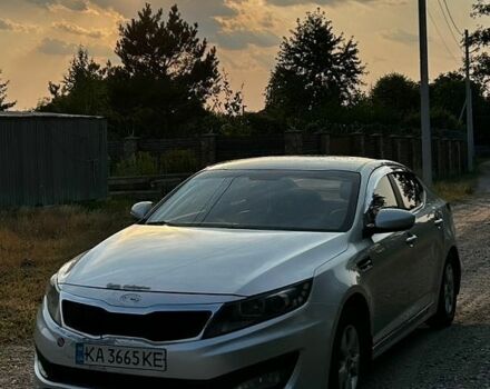 Серый Киа K5, объемом двигателя 2 л и пробегом 367 тыс. км за 5700 $, фото 1 на Automoto.ua