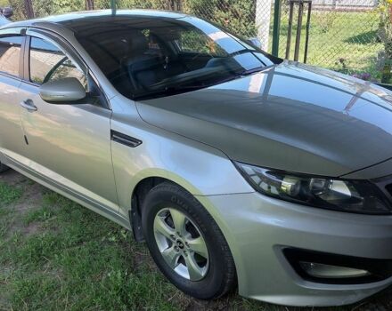 Серый Киа K5, объемом двигателя 2 л и пробегом 298 тыс. км за 7300 $, фото 1 на Automoto.ua