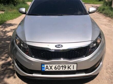 Серый Киа K5, объемом двигателя 2 л и пробегом 420 тыс. км за 7000 $, фото 1 на Automoto.ua