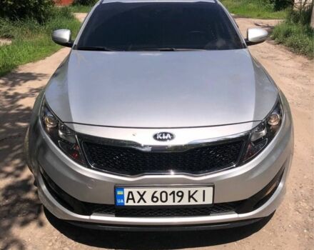 Серый Киа K5, объемом двигателя 2 л и пробегом 420 тыс. км за 7000 $, фото 1 на Automoto.ua