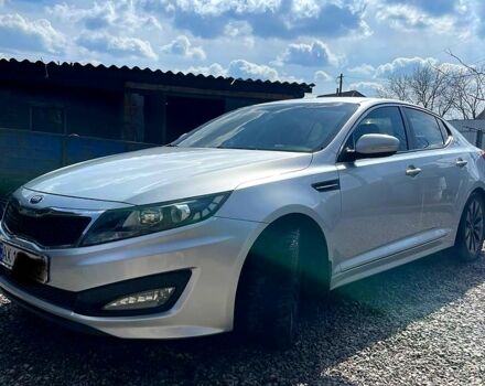 Серый Киа K5, объемом двигателя 20 л и пробегом 185 тыс. км за 9700 $, фото 1 на Automoto.ua