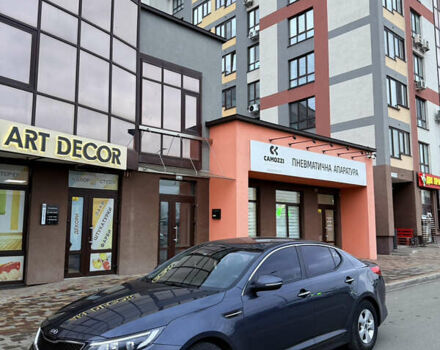 Сірий Кіа K5, об'ємом двигуна 2 л та пробігом 240 тис. км за 11400 $, фото 1 на Automoto.ua