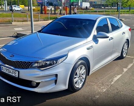 Серый Киа K5, объемом двигателя 2 л и пробегом 296 тыс. км за 10000 $, фото 1 на Automoto.ua