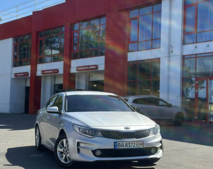 Серый Киа K5, объемом двигателя 2 л и пробегом 200 тыс. км за 12000 $, фото 1 на Automoto.ua
