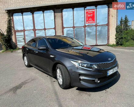 Серый Киа K5, объемом двигателя 2 л и пробегом 164 тыс. км за 13600 $, фото 1 на Automoto.ua