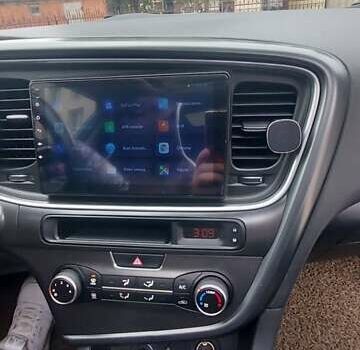 Синий Киа K5, объемом двигателя 2 л и пробегом 196 тыс. км за 10500 $, фото 19 на Automoto.ua