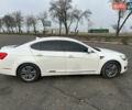 Белый Киа K7, объемом двигателя 3 л и пробегом 235 тыс. км за 11699 $, фото 10 на Automoto.ua