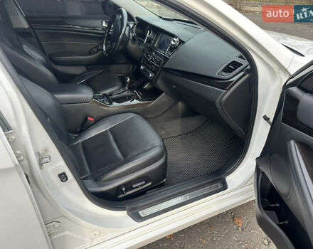 Белый Киа K7, объемом двигателя 3 л и пробегом 235 тыс. км за 11699 $, фото 19 на Automoto.ua