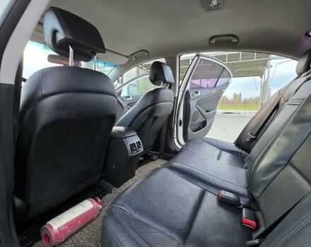 Білий Кіа K7, об'ємом двигуна 3 л та пробігом 187 тис. км за 10100 $, фото 14 на Automoto.ua