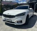 Белый Киа K7, объемом двигателя 3 л и пробегом 310 тыс. км за 13699 $, фото 1 на Automoto.ua