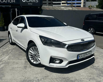 Белый Киа K7, объемом двигателя 3 л и пробегом 310 тыс. км за 13699 $, фото 1 на Automoto.ua