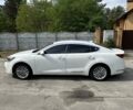 Белый Киа K7, объемом двигателя 3 л и пробегом 310 тыс. км за 13699 $, фото 2 на Automoto.ua