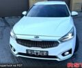 Белый Киа K7, объемом двигателя 3 л и пробегом 220 тыс. км за 17800 $, фото 1 на Automoto.ua