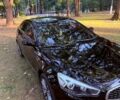 Черный Киа K7, объемом двигателя 3 л и пробегом 225 тыс. км за 12500 $, фото 1 на Automoto.ua