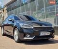 Чорний Кіа K7, об'ємом двигуна 3 л та пробігом 232 тис. км за 13999 $, фото 1 на Automoto.ua