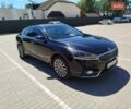 Черный Киа K7, объемом двигателя 3 л и пробегом 233 тыс. км за 14500 $, фото 1 на Automoto.ua