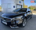 Черный Киа K7, объемом двигателя 3 л и пробегом 139 тыс. км за 15500 $, фото 1 на Automoto.ua